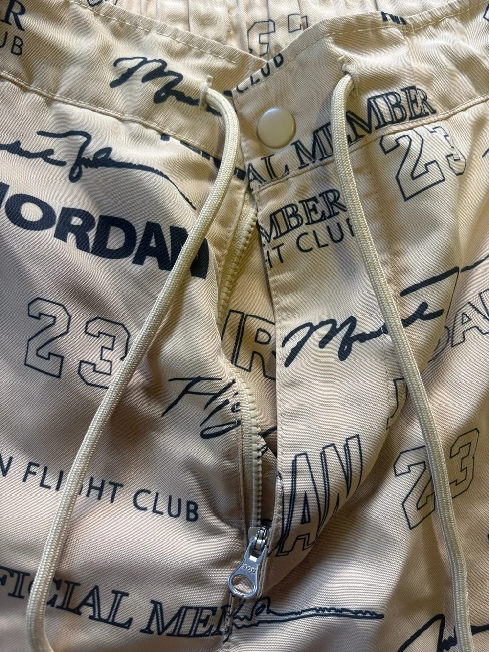 Jordan Men's Tan All-Over Logo Athletic Shorts